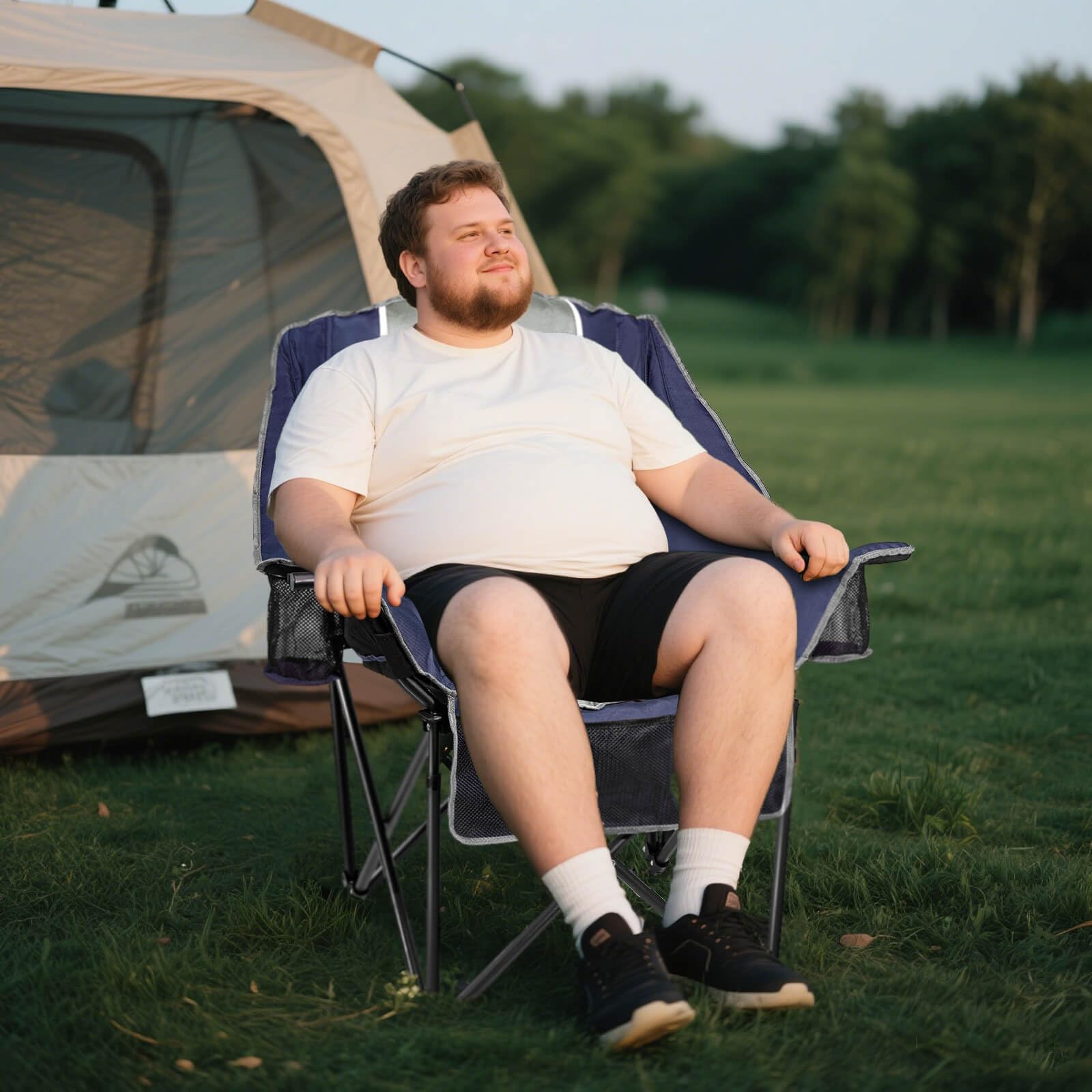 Behairity oversized camping chair with cupholders provides easy drink access.