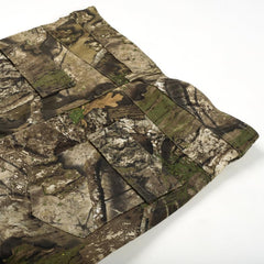 Bell Rangers Realtree APX camo pants zipper vent detail aids airflow during active hiking.