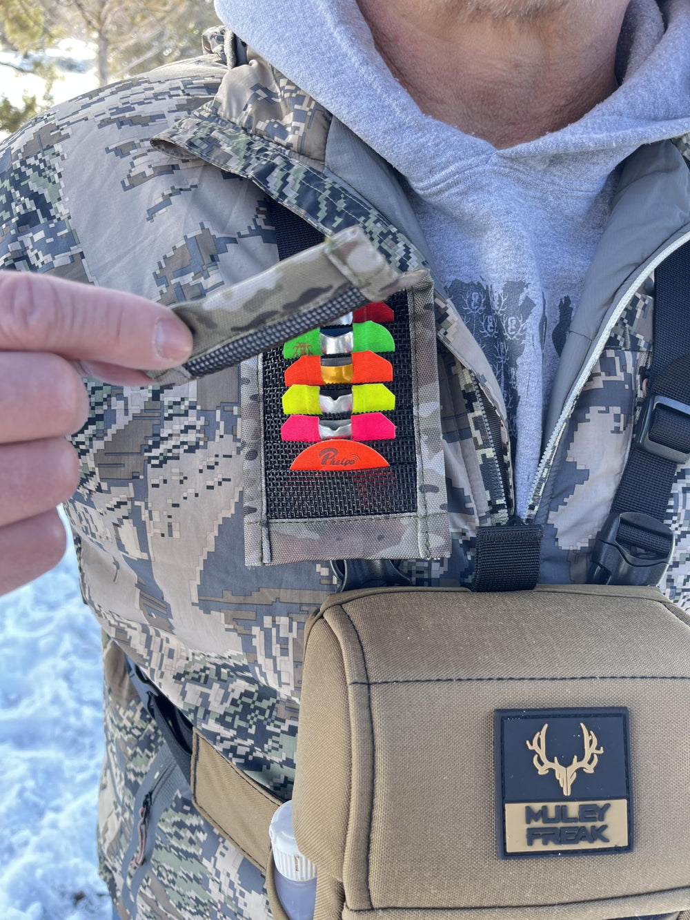 Bend-Able Guide Express easily attaches to backpack straps or chest harness for ready reach.