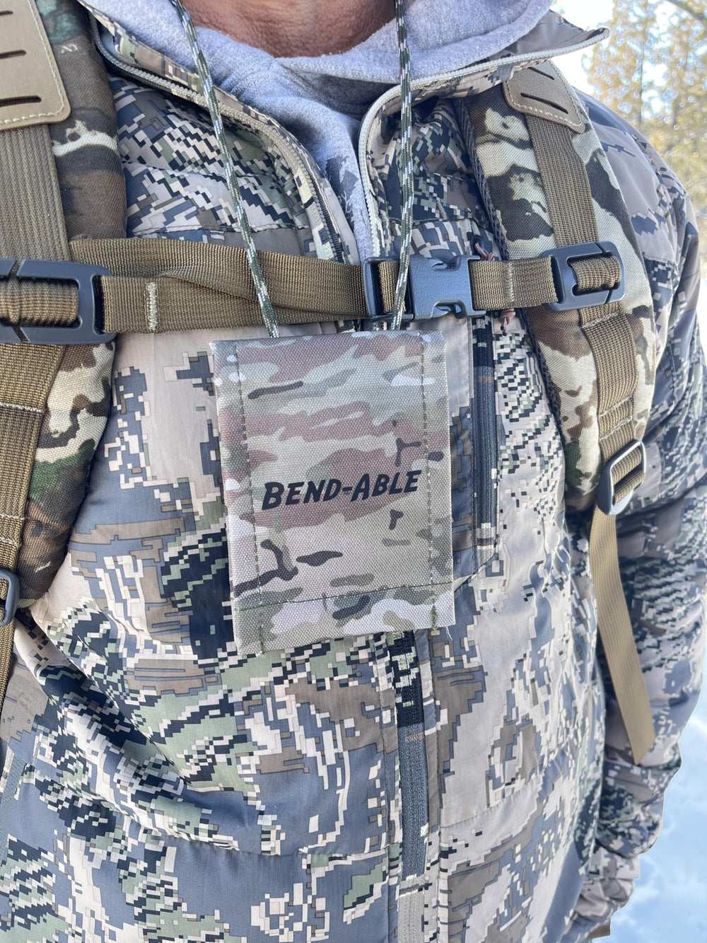 Bend-Able Guide Express demonstrates neck lanyard and hook-and-loop mounting for hands-free use.