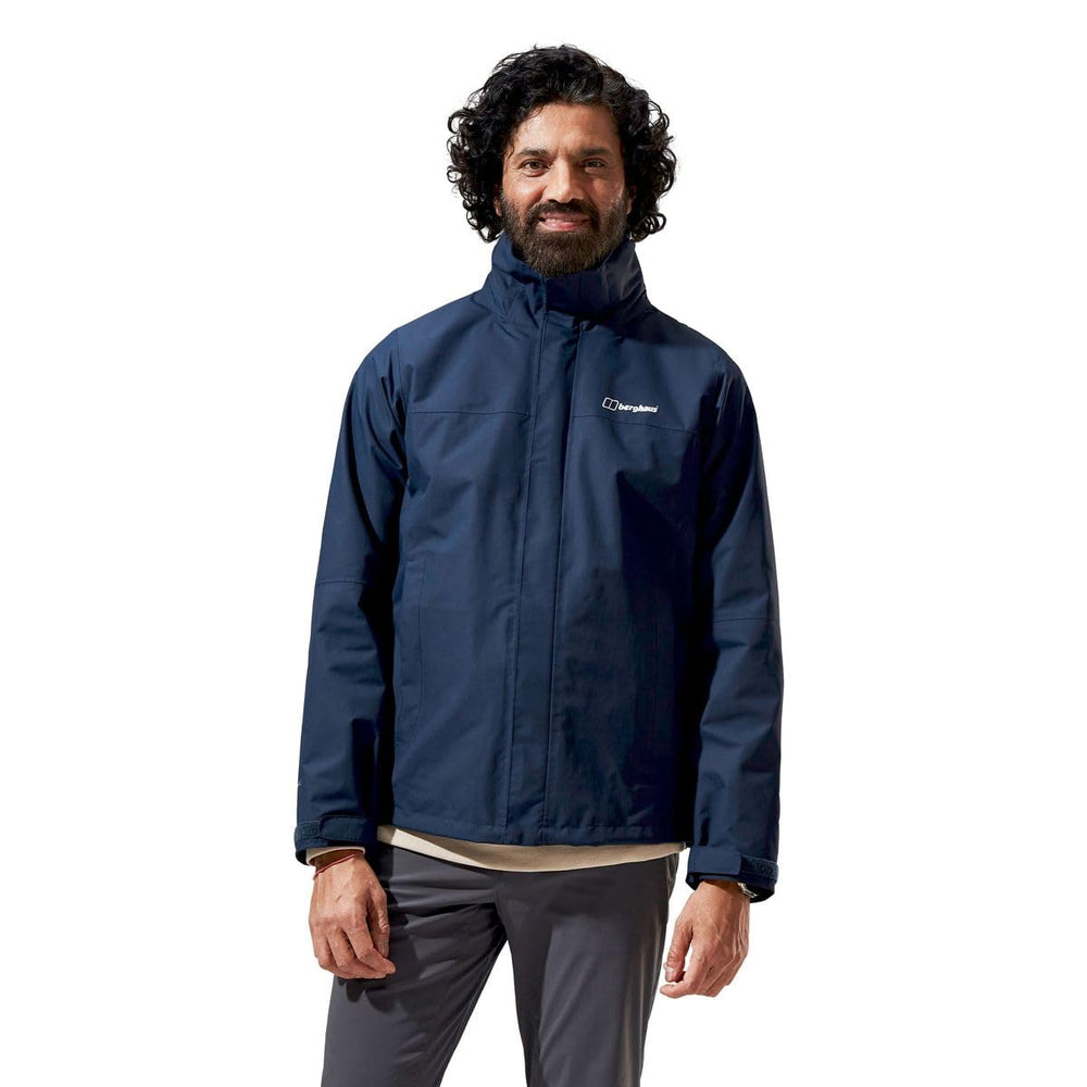 Berghaus RG Alpha 2.0 hood up demonstrates reliable rain protection during weather changes.
