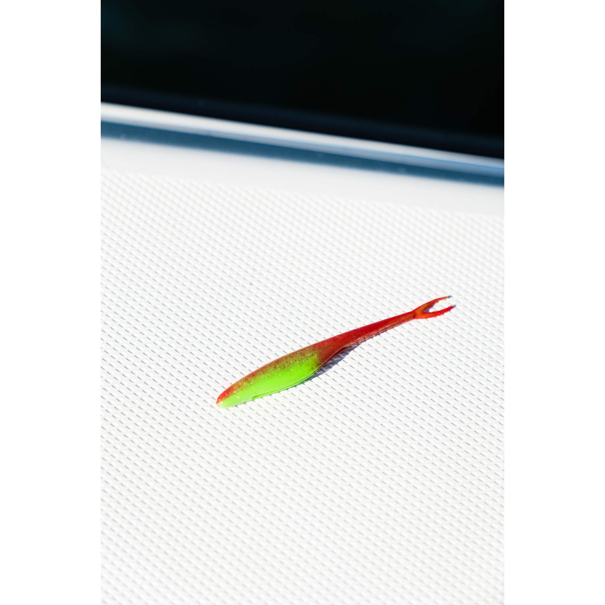 Berkley Gulp saltwater jerk shad working wood and dock edges, pearl white.