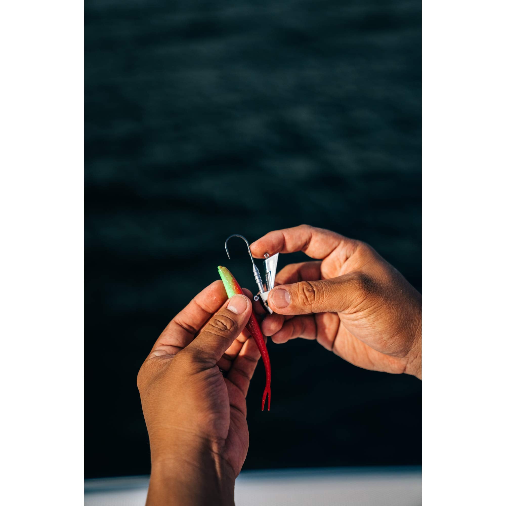Berkley Gulp! Saltwater Jerk Shad Smelt dam-structure zones draw bites with erratic motion.