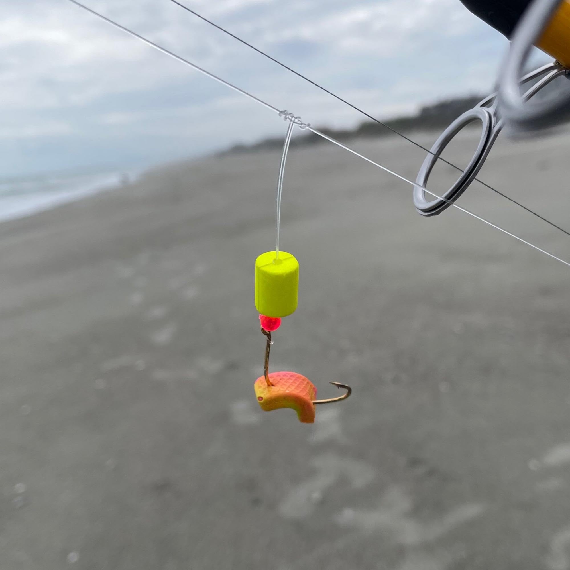 Berkley Gulp! Surf Bytes Strips chartreuse shown for quick rig changes on the beach.