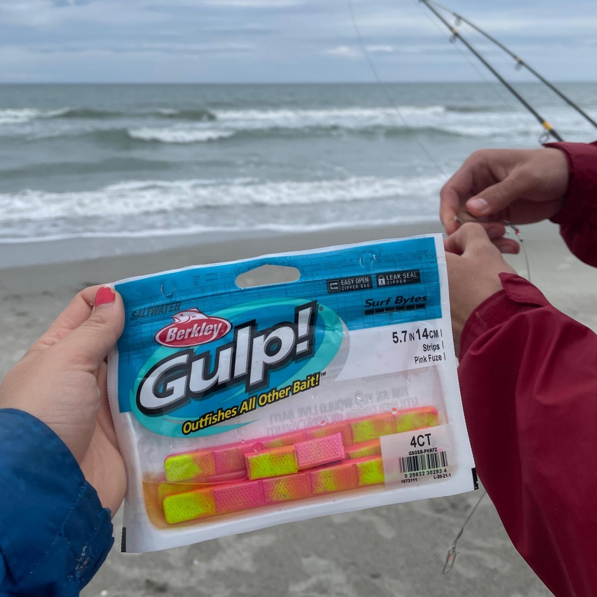 Berkley Gulp! Surf Bytes Strips chartreuse visible in breaking waves for lure appeal.