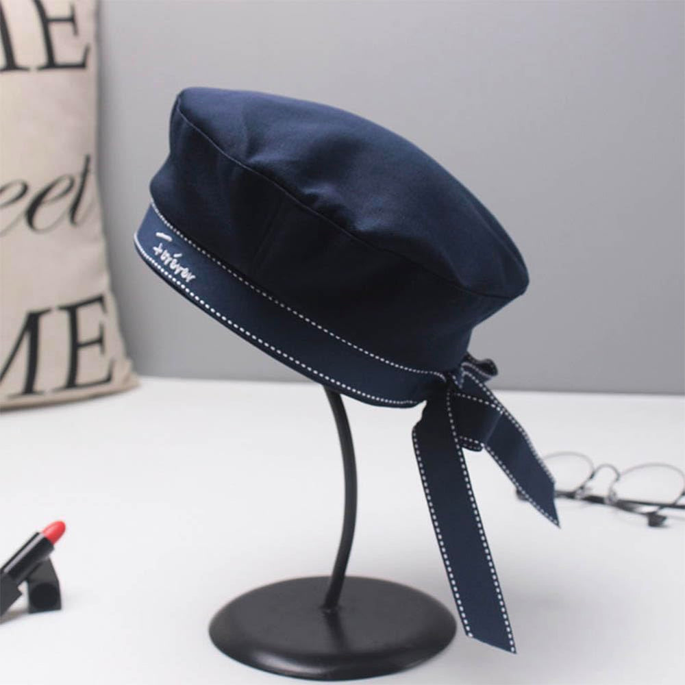 Besforta navy sailor hat bow-knot closeup showing adjustable band for comfort.