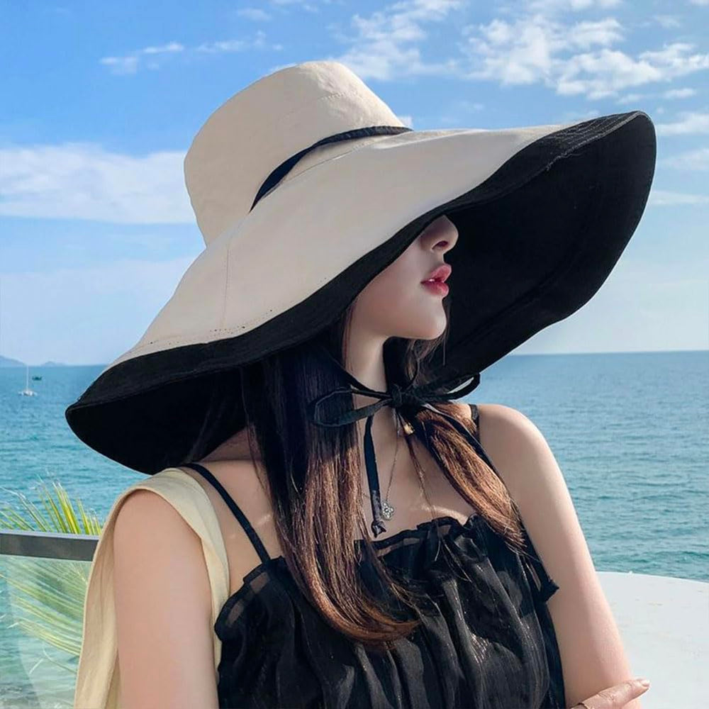 Besforta large-brim sun hat worn at beach for shade and comfort.