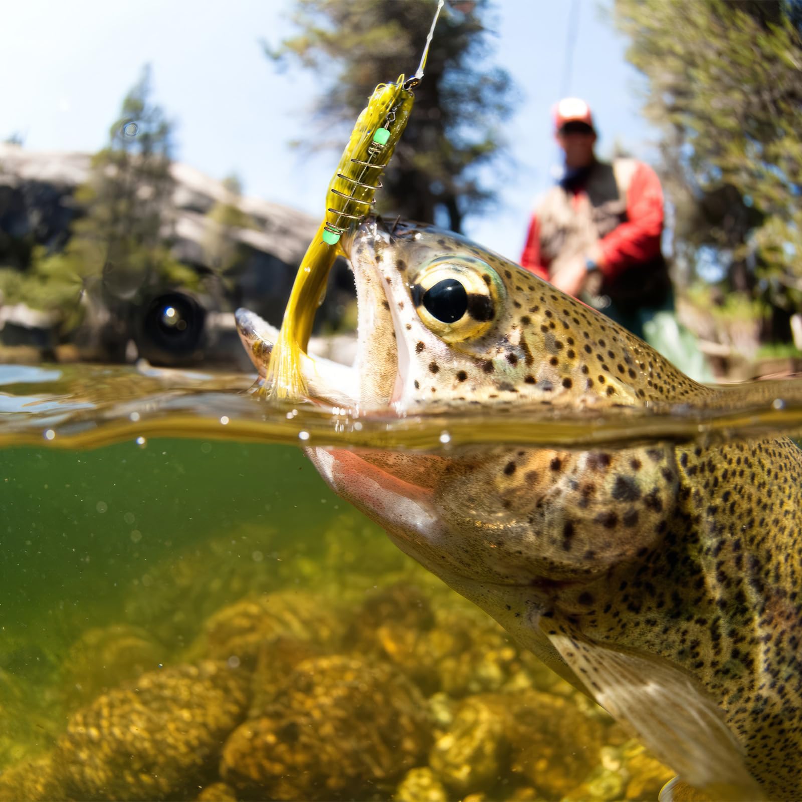 Angler attaching bait to cage with luminous beads