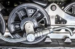 Between the Lines Designs Bogie wheel hook installation on billet aluminum.