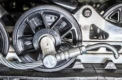 Between the Lines Designs Bogie wheel hook installation on billet aluminum.