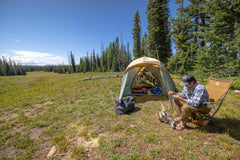 Big Agnes Big Six Armchair with two cup holders keeps beverages within reach.