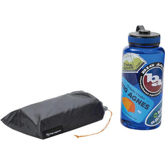 Big Agnes footprint in use during bikepacking setup adds protection and ground clearance
