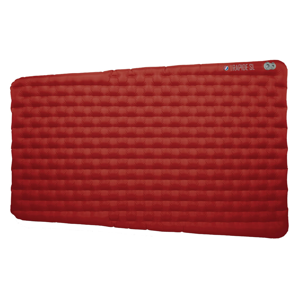 Big Agnes Rapide SL insulated sleeping pad in pack shows compact warmth for three-season trips.