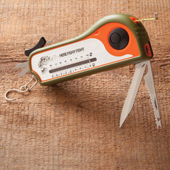 Close-up of tape measure and weighted fish scale