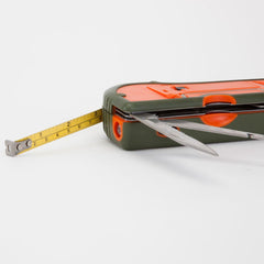Fish scraper, bottle opener, and LED flashlight features