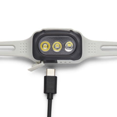 BLACK DIAMOND Deploy 325 headlamp side-switch controls enable easy brightness and modes.