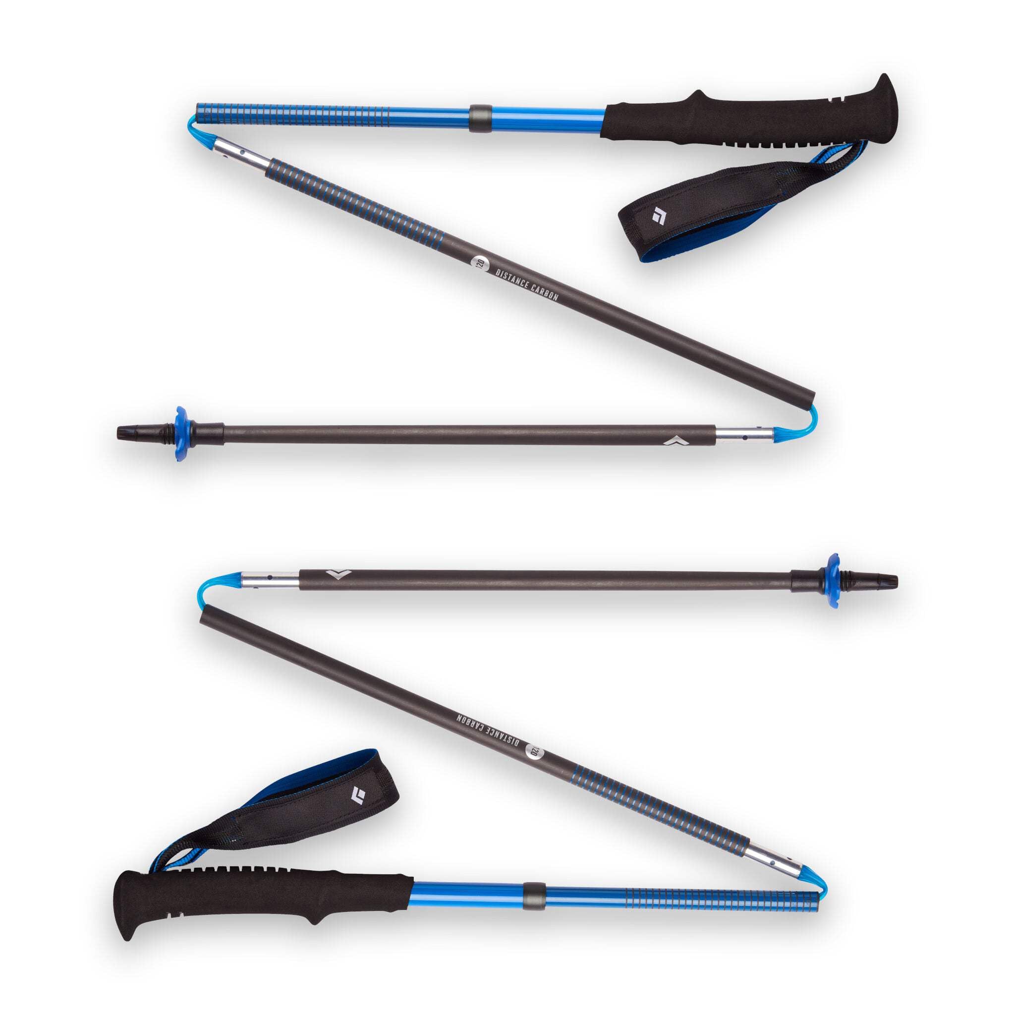 Black Diamond Distance Carbon Z Trekking Poles in use while running on a rocky ascent.