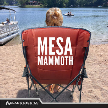 Black Sierra Oversized Camping Chair side pockets and cup holder for quick access.