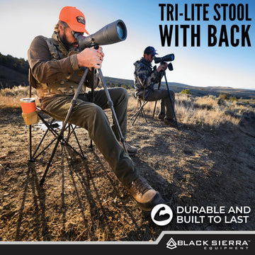 Black Sierra XL Tri-Lite stool with tri-leg design for uneven ground.