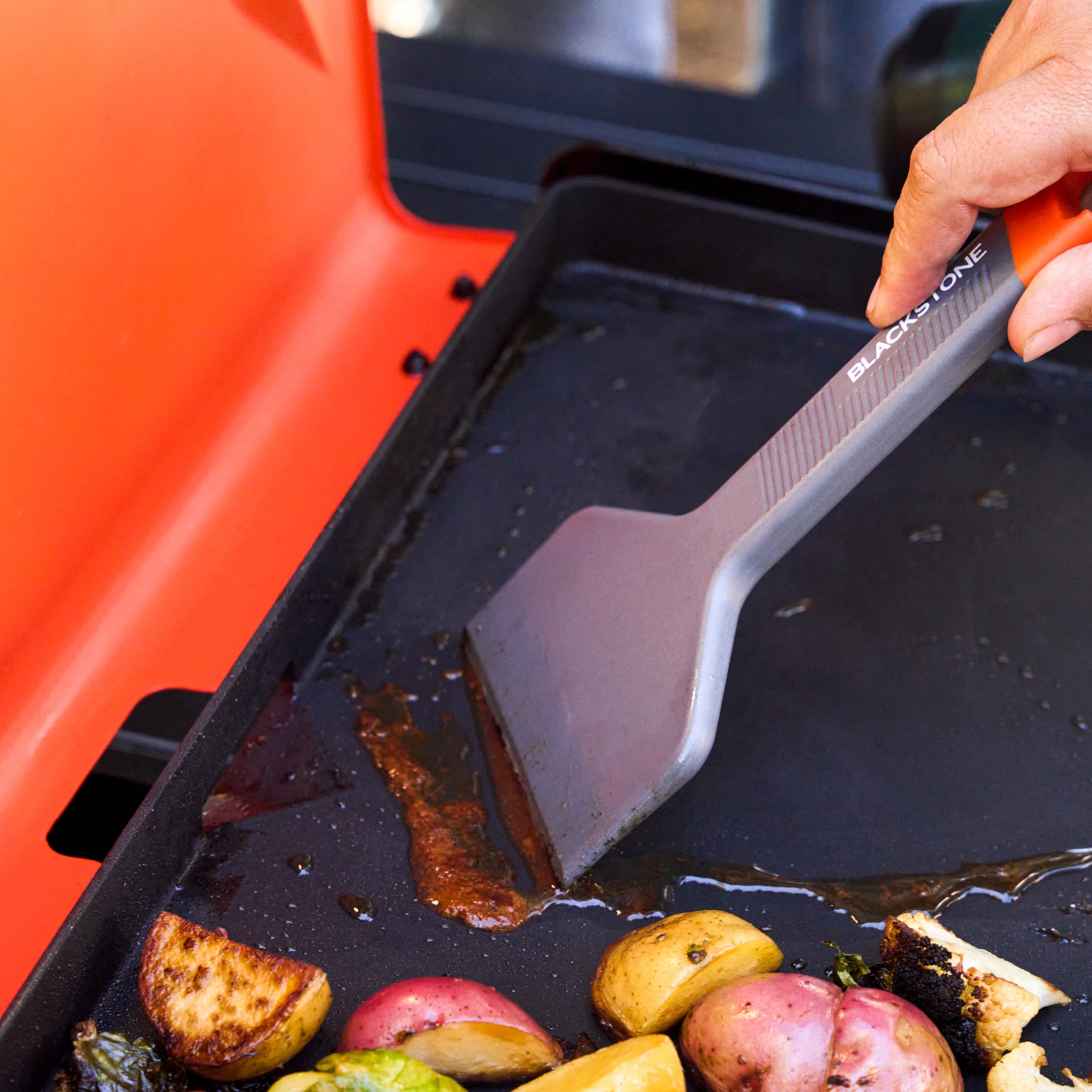 Blackstone 5984 outdoor cooking scene at campsite
