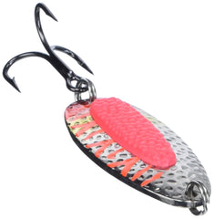 Blue Fox Pixee Spoon in water reflects light to attract salmon and trout.