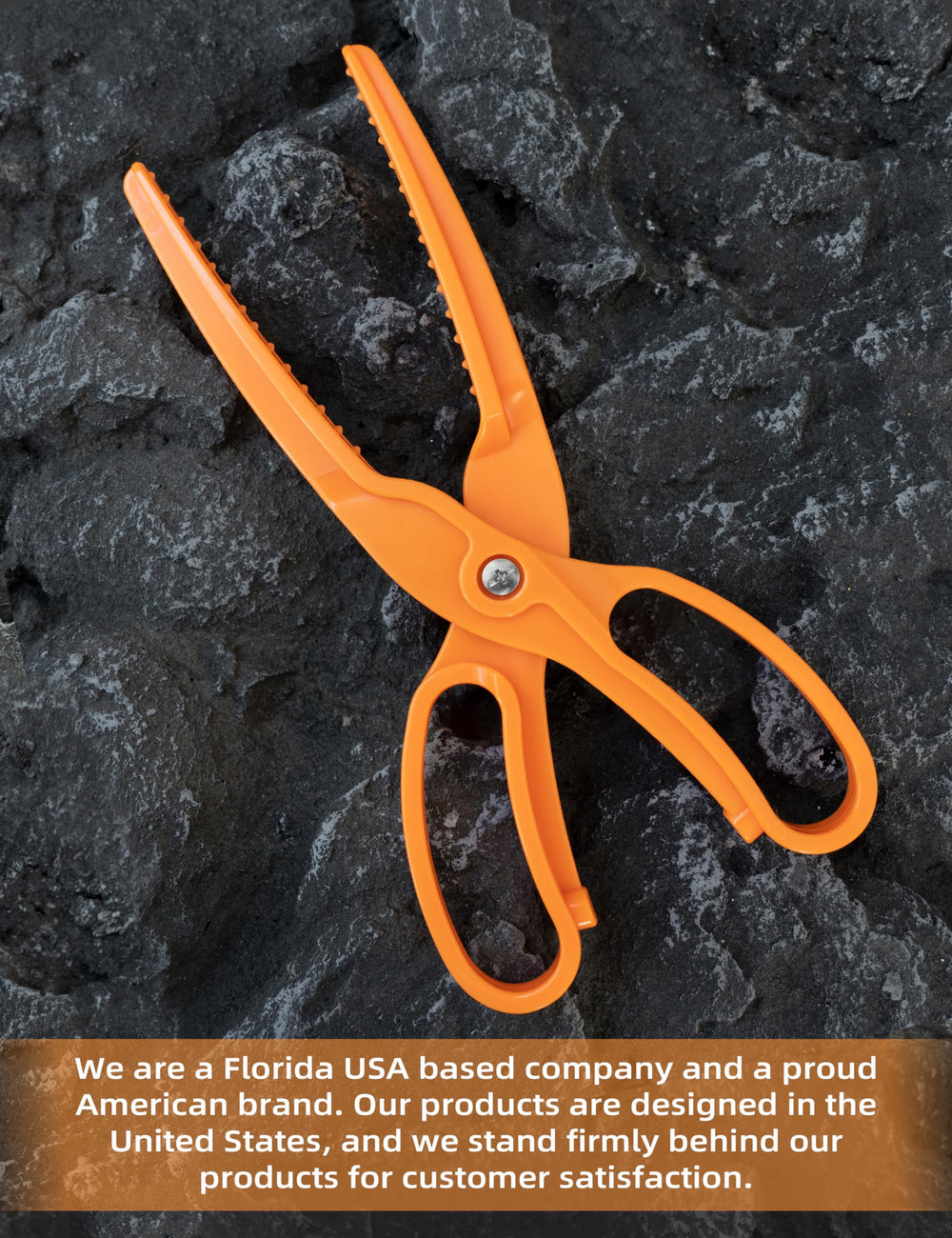 BLUEWING fishing gripper orange in-use on fish demonstrates one-handed operation.