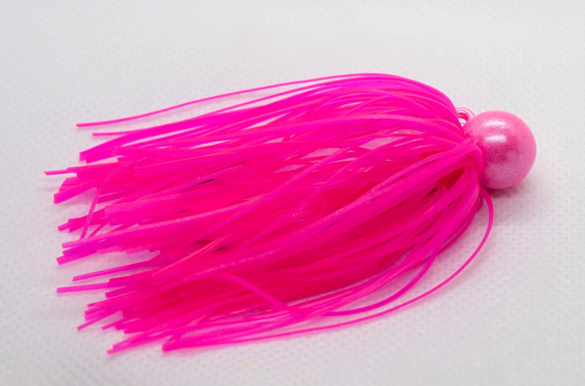 BNR Twitch Jig Pink half-oz with a bushy silicone body to attract coho and salmon.