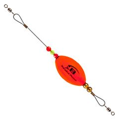 BOMBER Salt Water Paradise Popper Xtreme Jig in orange creating a splash to lure coastal fish.