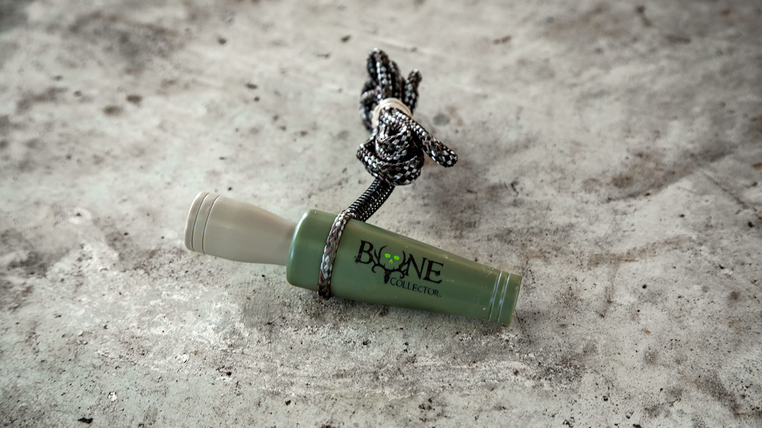 Bone Collector Doe Bleat Call in field setup demonstrates realistic estrous sounds.