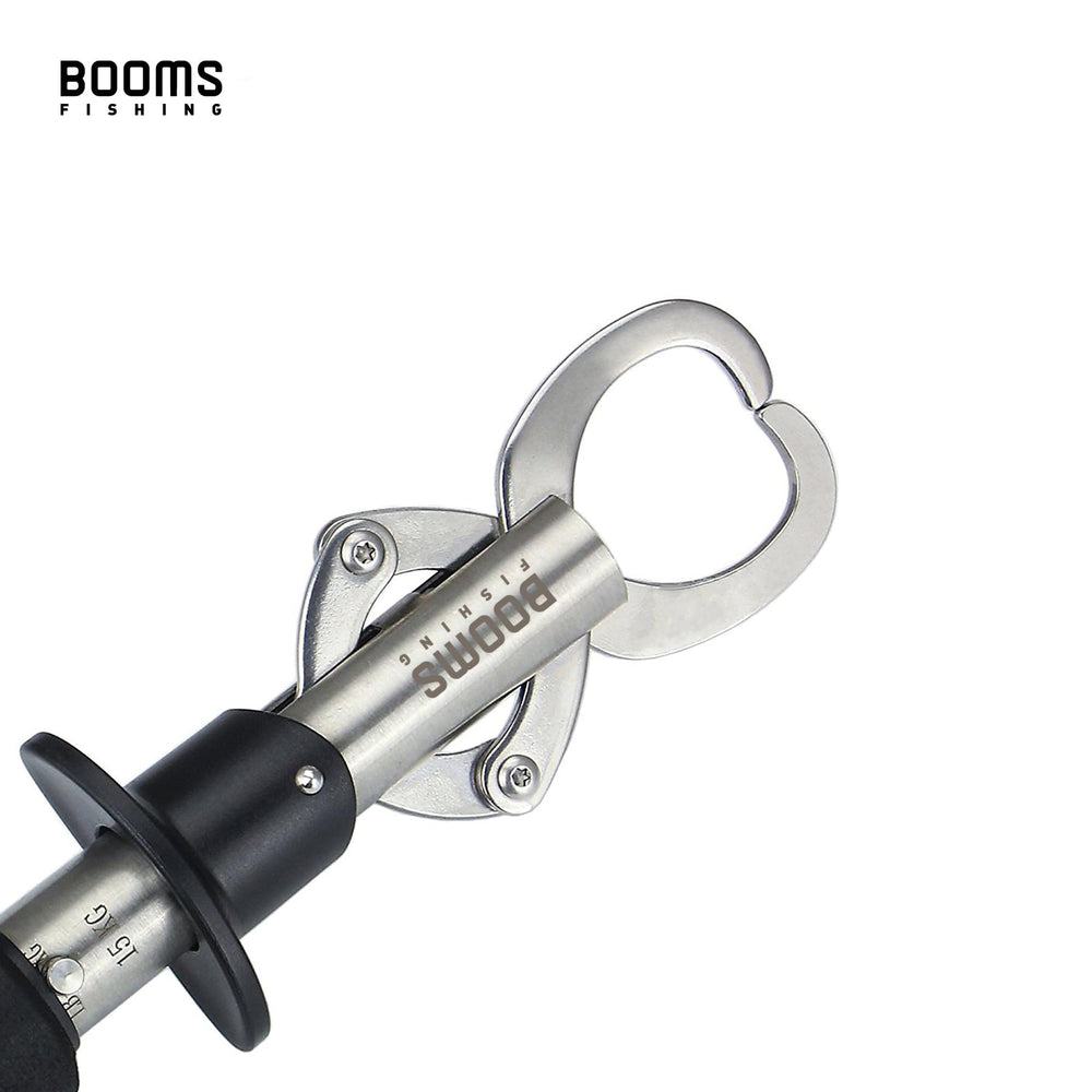 Booms Fishing G01 in-use grip demonstrating one-handed operation while landing a catch.