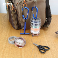 Aluminum carabiner attached for vest or pack