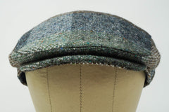 Galway patchwork tweed cap close up weave texture showing rich pattern