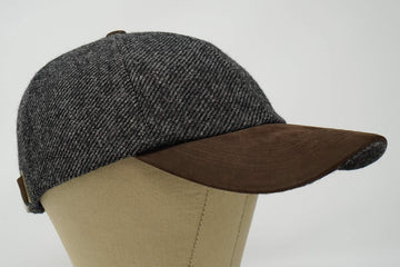 Borges and Scott The Sligo cap with water-resistant tweed shedding drizzle.