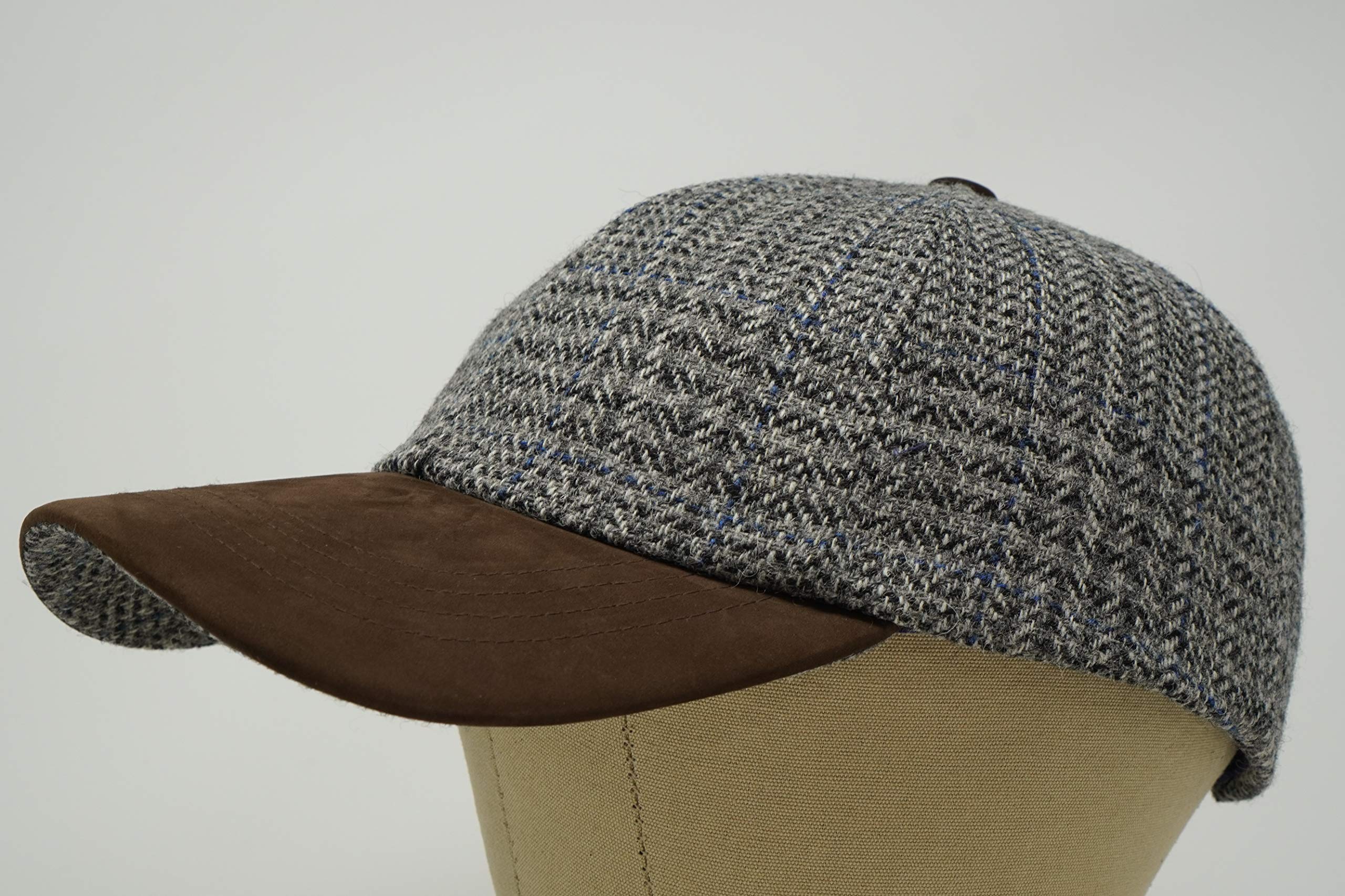 Nubuck peak detail on The Sligo cap emphasizes weather-ready craftsmanship.