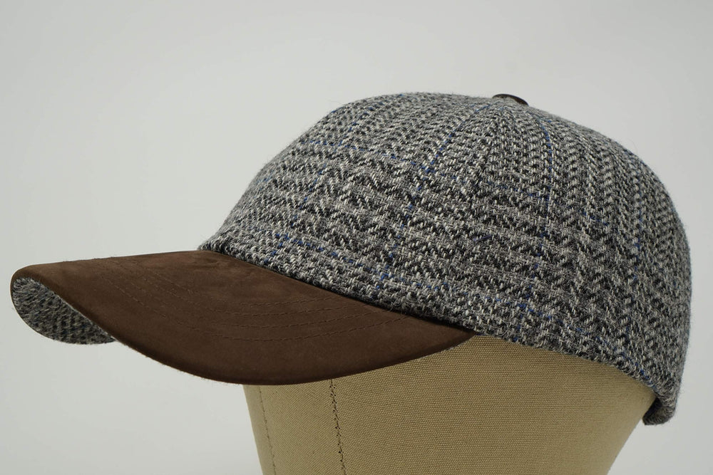 Nubuck peak detail on The Sligo cap emphasizes weather-ready craftsmanship.