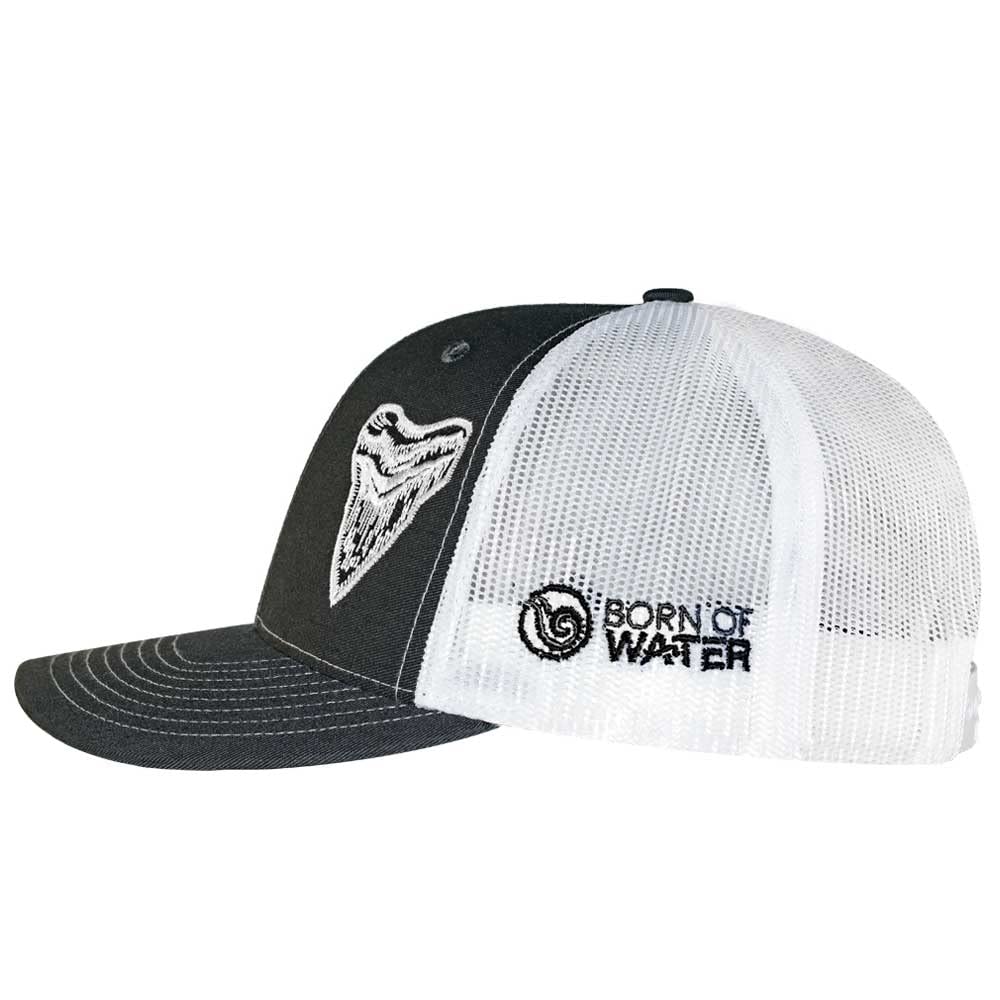 Close-up of Megalodon shark tooth design on a gray/white trucker hat