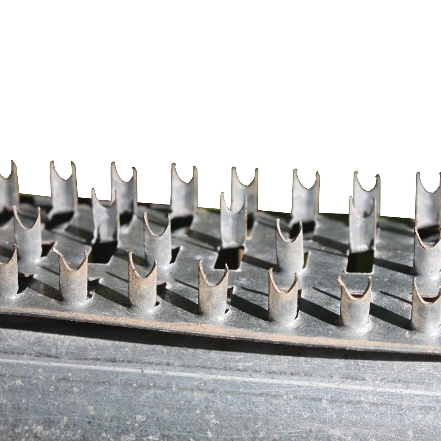 Shark Teeth Deterrent Strips installed on deer feeder legs
