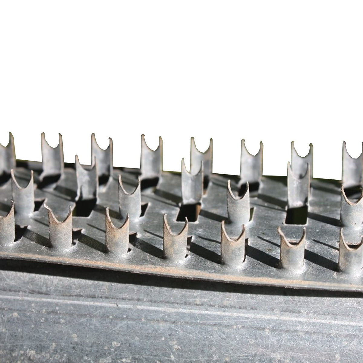Shark Teeth Deterrent Strips installed on deer feeder legs