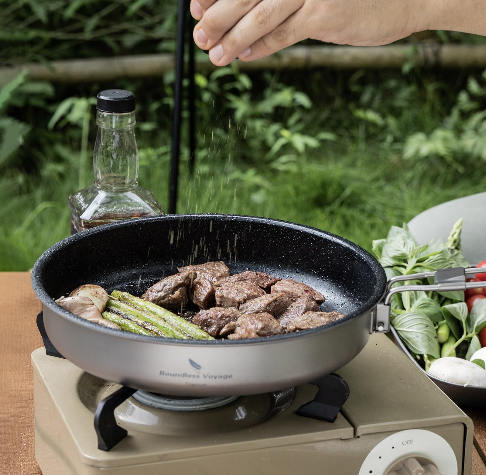 Boundless Voyage camping kitchen scene with pan ready on portable stove.