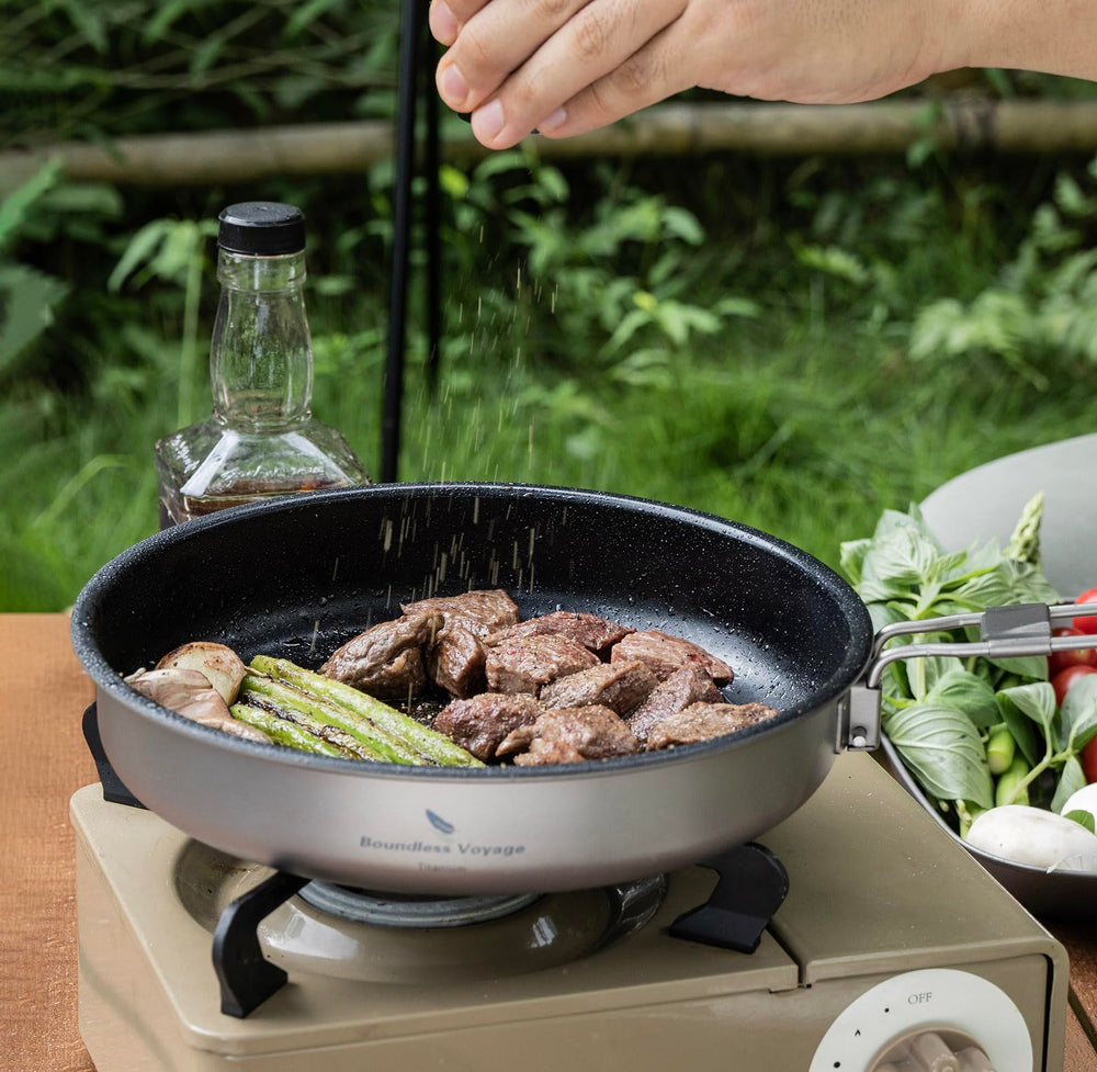 Boundless Voyage camping kitchen scene with pan ready on portable stove.