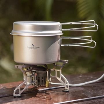 Boundless Voyage packable-backpacking kit with 1200ml pot and 500ml pan on trail.