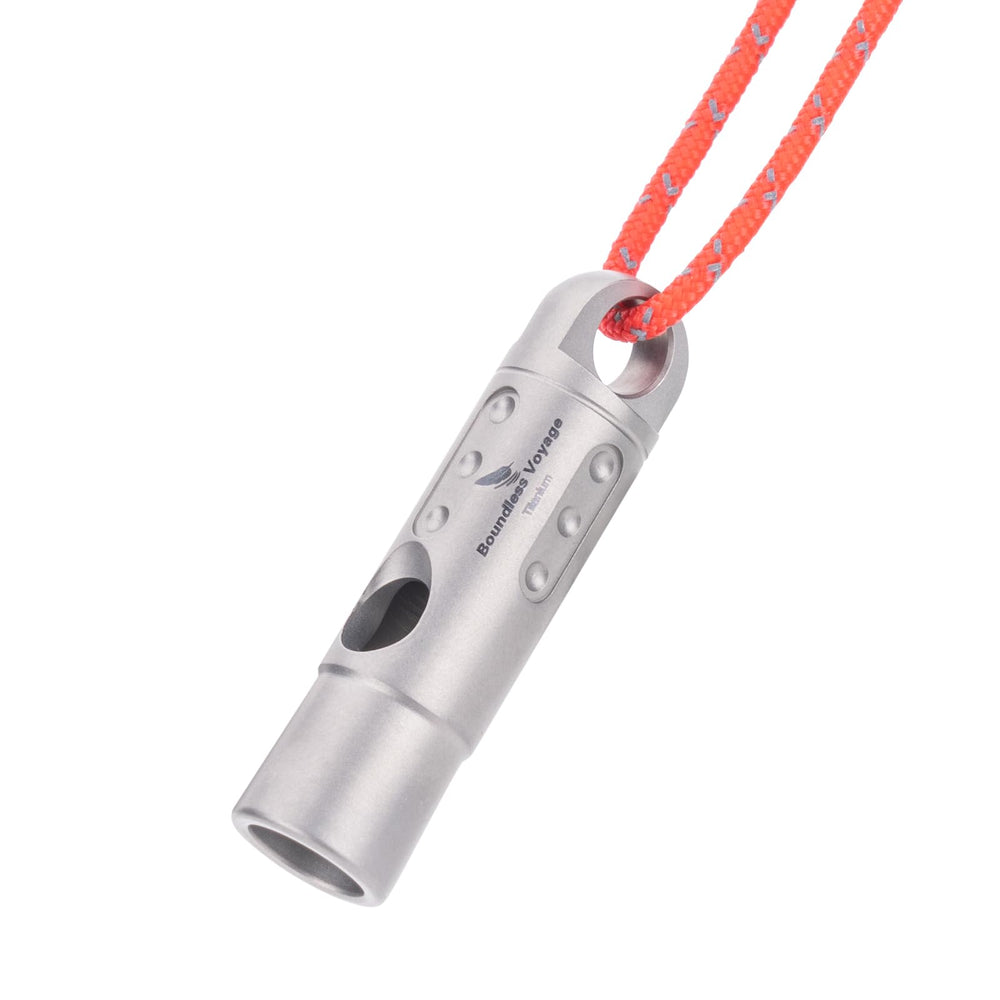 Boundless Voyage Ti9016 titanium whistle on a keychain, compact and ready for emergencies.