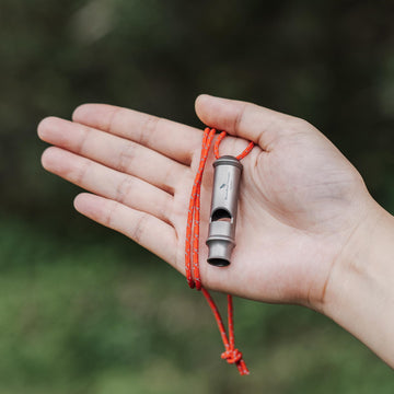 Ti9019O on a backpack for easy emergency signaling on the go.