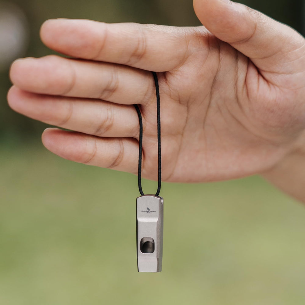 Boundless Voyage Ti9020 whistle back view showing durable titanium construction.