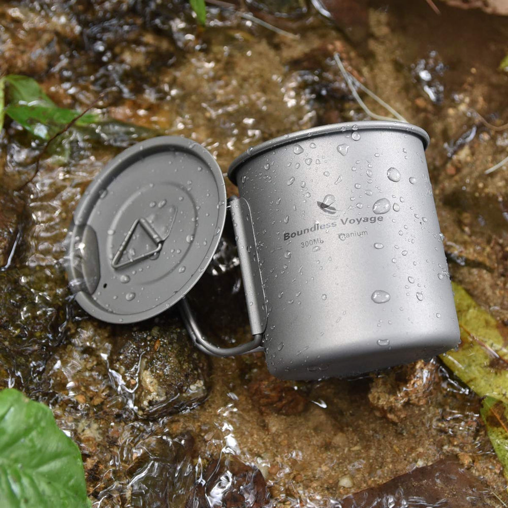 Boundless Voyage titanium cup in backpack during a hike.