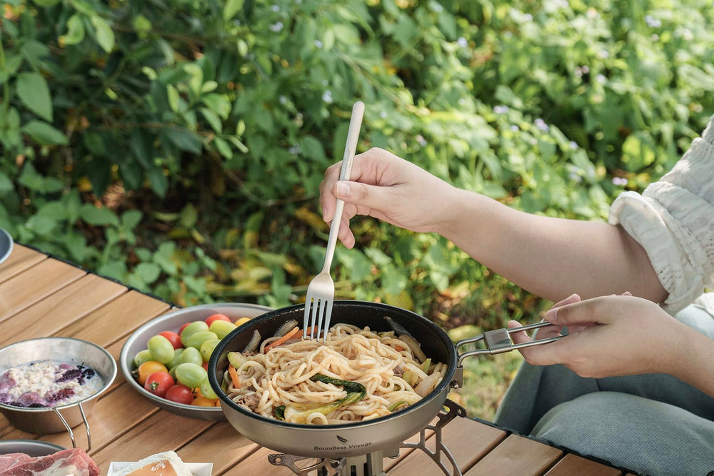 Boundless Voyage tent campsite setup with titanium cutlery set