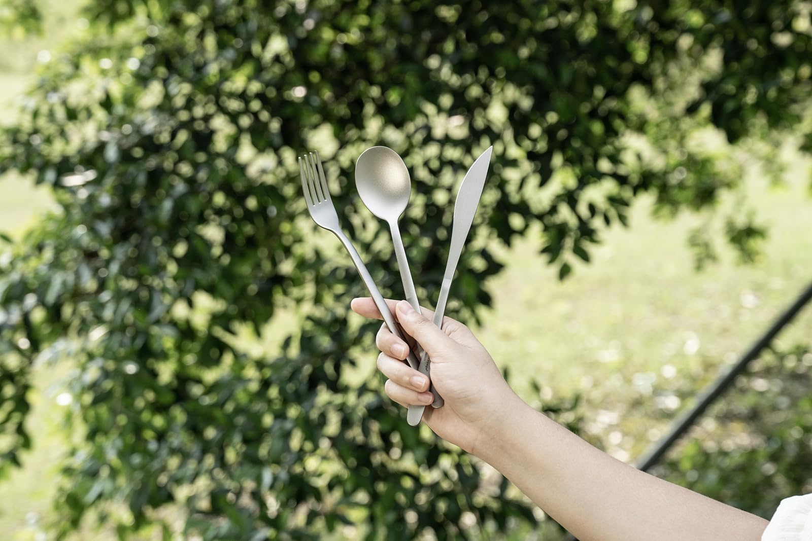 Boundless Voyage travel-ready cutlery with bag on kitchen counter