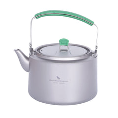 Boundless Voyage titanium kettle 1200ml ready to pour hot water outdoors.