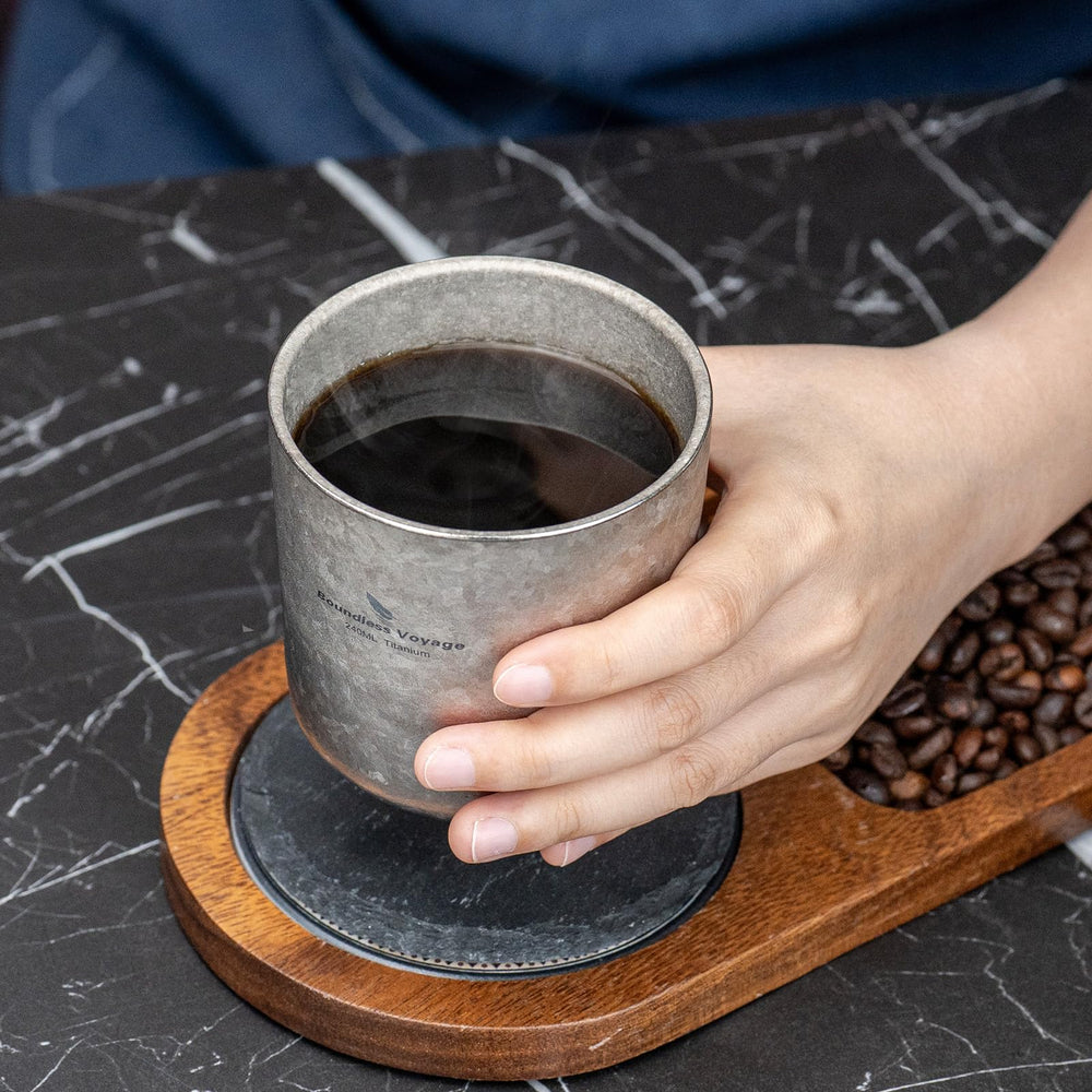 Boundless Voyage titanium mug undergoing travel-safe durability and shape retention.