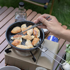 Boundless Voyage frying pan with folded handle, ideal for backpacking and storage.